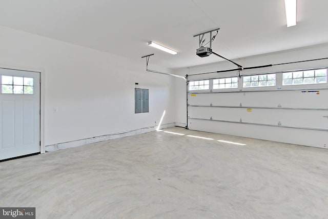 7430 Foundation Way, Springfield, VA 22150 - garage featuring electric panel and a garage door opener