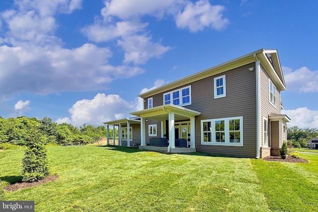 7430 Foundation Way, Springfield, VA 22150 - rear view of property with a lawn