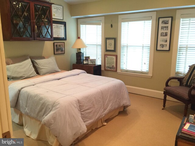 1324 10th St NW, Washington, DC 20001 - carpeted bedroom with baseboards