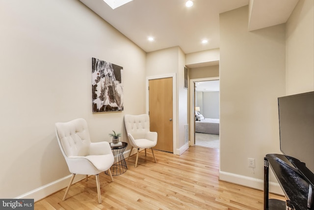 1324 10th St NW, Washington, DC 20001 - sitting room featuring light wood-type flooring, baseboards, recessed lighting, and a skylight