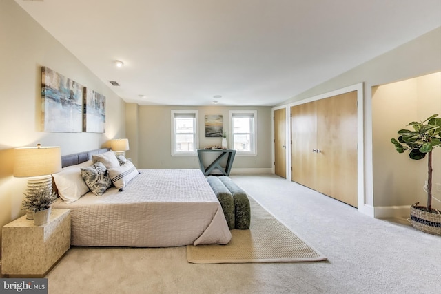 1324 10th St NW, Washington, DC 20001 - bedroom with baseboards and light carpet