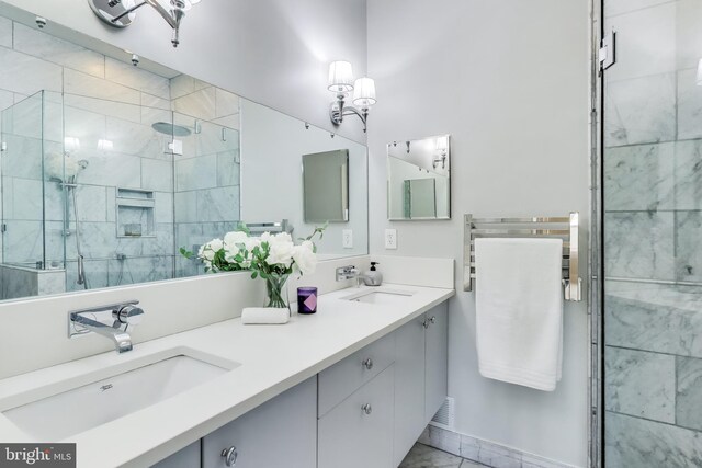 1324 10th St NW, Washington, DC 20001 - bathroom with a stall shower, marble finish flooring, double vanity, and a chandelier
