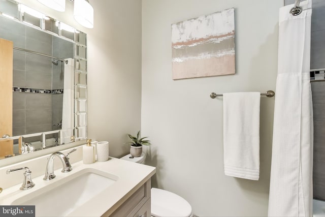 1324 10th St NW, Washington, DC 20001 - full bath featuring a tile shower, vanity, and toilet