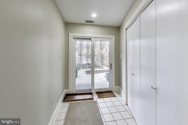 1324 10th St NW, Washington, DC 20001 - doorway with light tile patterned floors and baseboards