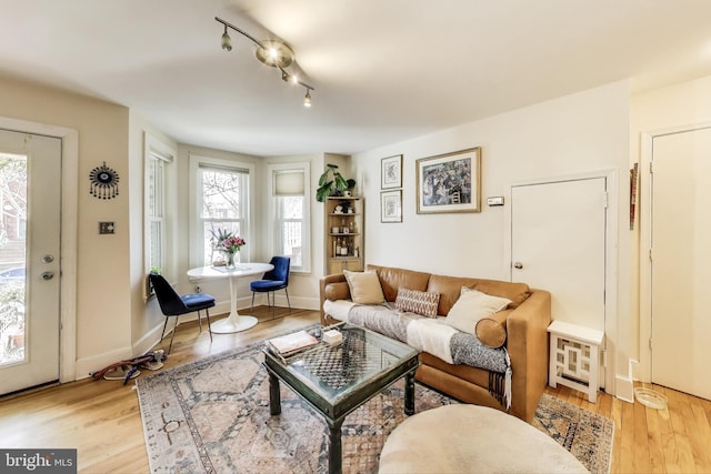 1324 10th St NW, Washington, DC 20001 - living room featuring light wood-style floors and baseboards
