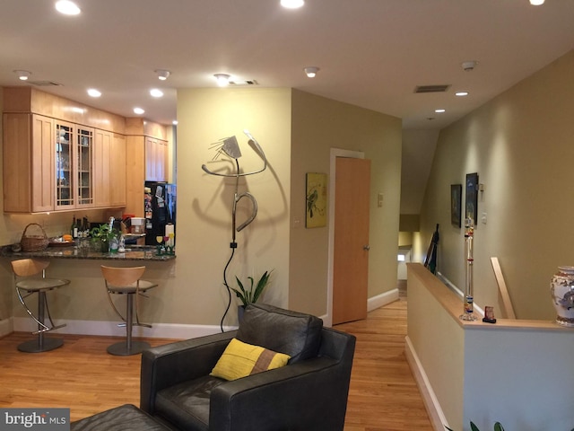 1324 10th St NW, Washington, DC 20001 - living room featuring light wood-style floors, recessed lighting, and baseboards