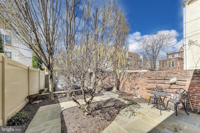 1324 10th St NW, Washington, DC 20001 - fenced backyard featuring a patio