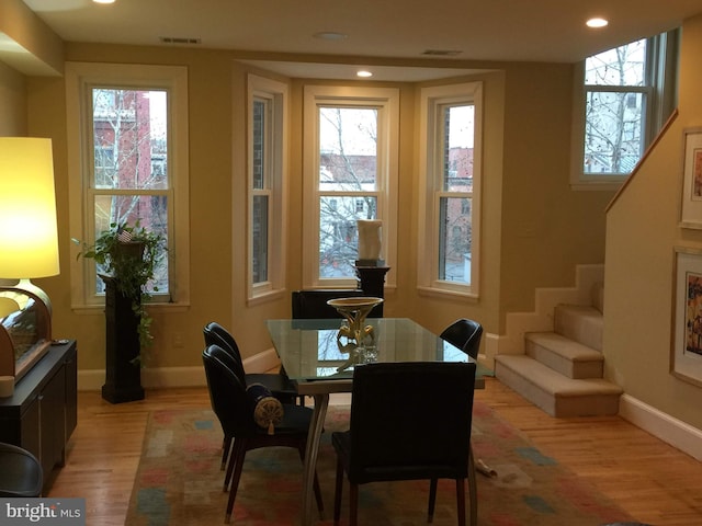 1324 10th St NW, Washington, DC 20001 - dining space featuring stairway, light wood-style flooring, baseboards, and recessed lighting