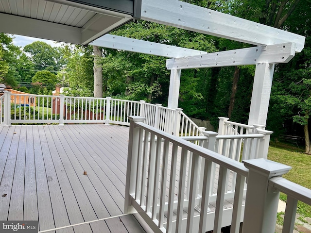 deck with view of wooded area