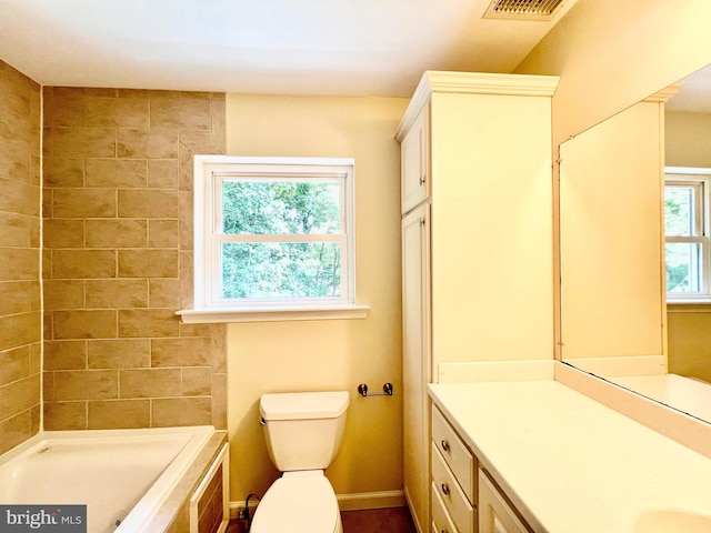 full bath with vanity, toilet, a shower, and baseboards