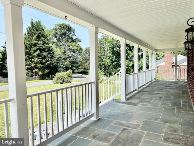 view of patio featuring a porch
