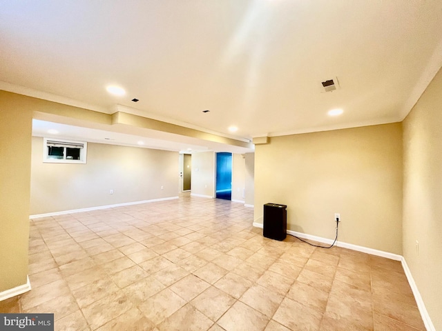 spare room with recessed lighting and baseboards