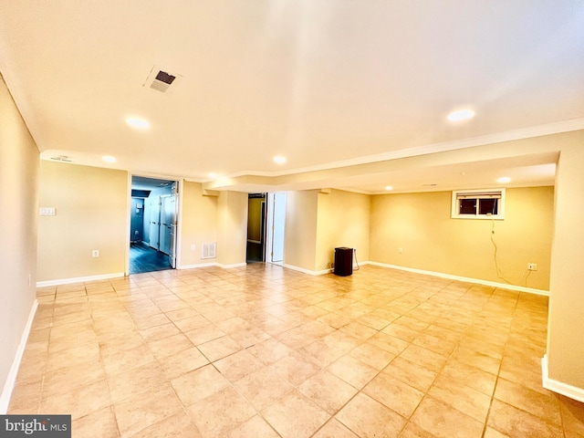 unfurnished room featuring recessed lighting, baseboards, ornamental molding, and light tile patterned floors
