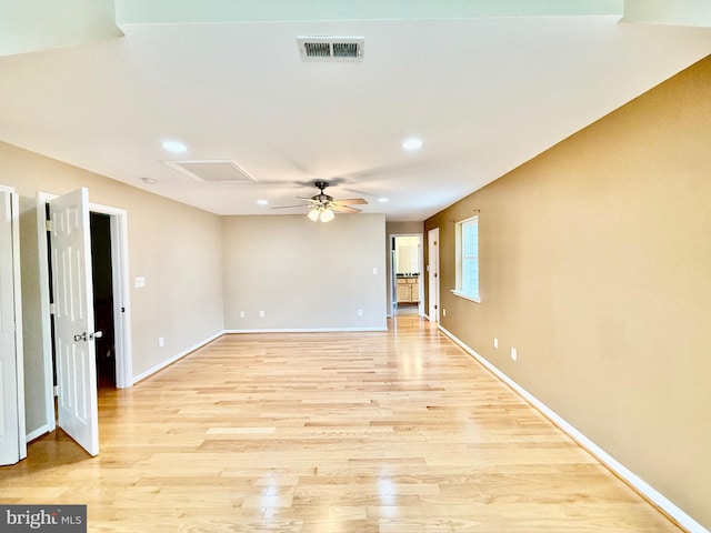 unfurnished room featuring light wood finished floors, ceiling fan, baseboards, and recessed lighting