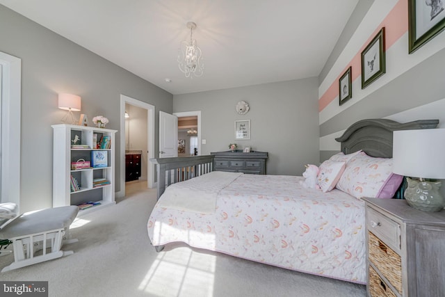 bedroom featuring light colored carpet and a chandelier