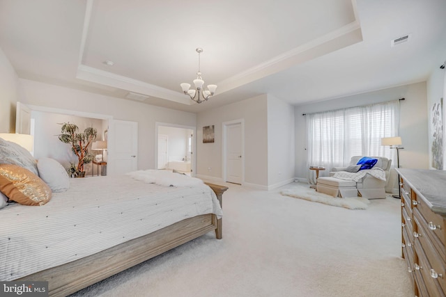 bedroom with a chandelier, a tray ceiling, light colored carpet, crown molding, and baseboards