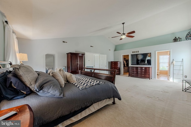 269 Bucktail Dr, Middletown, DE 19709 - bedroom featuring vaulted ceiling, light carpet, a ceiling fan, and a spacious closet