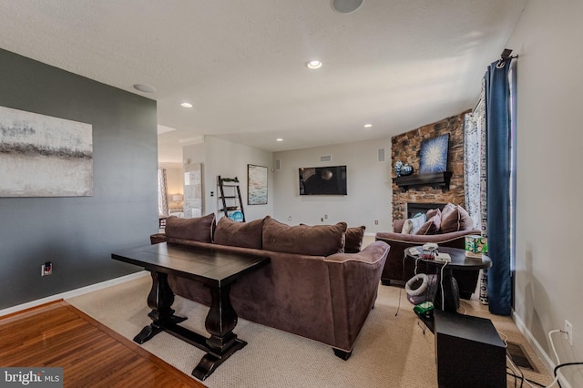 269 Bucktail Dr, Middletown, DE 19709 - living room featuring baseboards, light wood-style floors, a fireplace, and recessed lighting