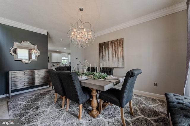 269 Bucktail Dr, Middletown, DE 19709 - carpeted dining space with a chandelier, ornamental molding, and baseboards