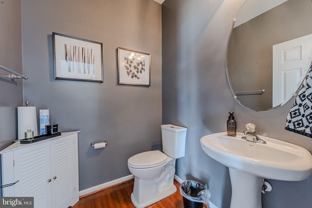269 Bucktail Dr, Middletown, DE 19709 - bathroom featuring wood finished floors, baseboards, and toilet