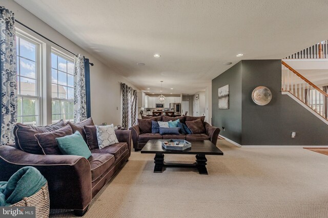 269 Bucktail Dr, Middletown, DE 19709 - carpeted living room featuring stairway, recessed lighting, and baseboards