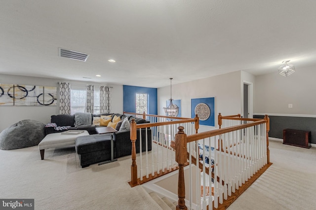 269 Bucktail Dr, Middletown, DE 19709 - carpeted living area with a chandelier, recessed lighting, and baseboards