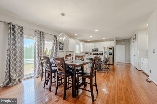 269 Bucktail Dr, Middletown, DE 19709 - dining area featuring light wood finished floors, a chandelier, recessed lighting, and baseboards