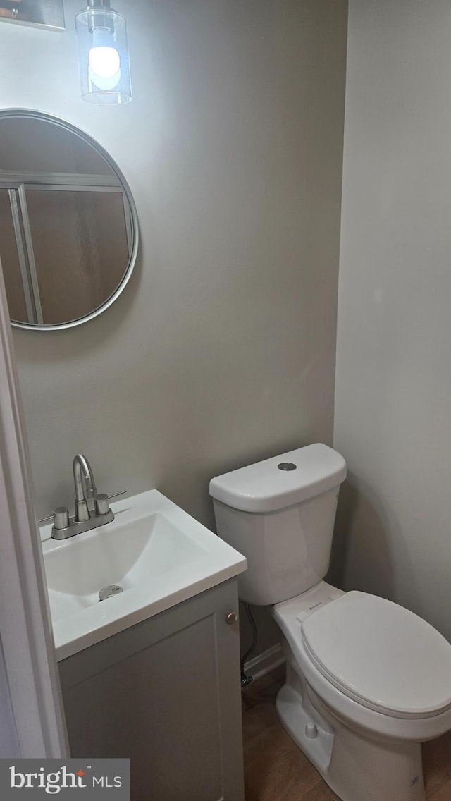 38261 Yacht Basin Rd Unit 35, Ocean View, DE 19970 - half bathroom featuring vanity and wood finished floors