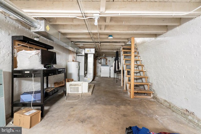 15 N Belnord Ave, Baltimore, MD 21224 - unfinished below grade area with gas water heater, heating unit, and a textured wall