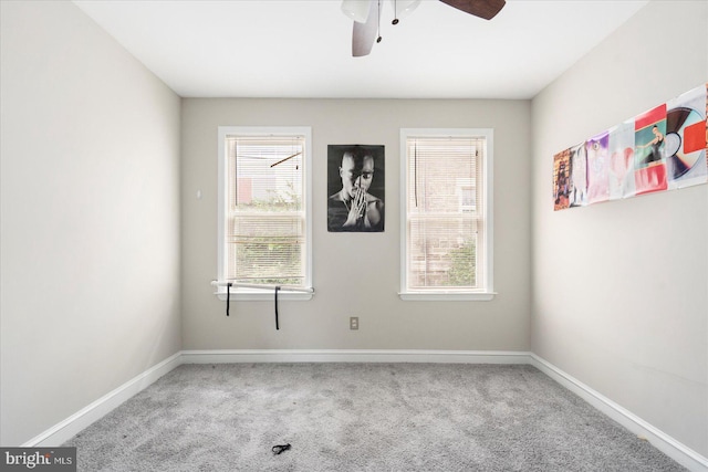 15 N Belnord Ave, Baltimore, MD 21224 - carpeted empty room featuring baseboards and a ceiling fan