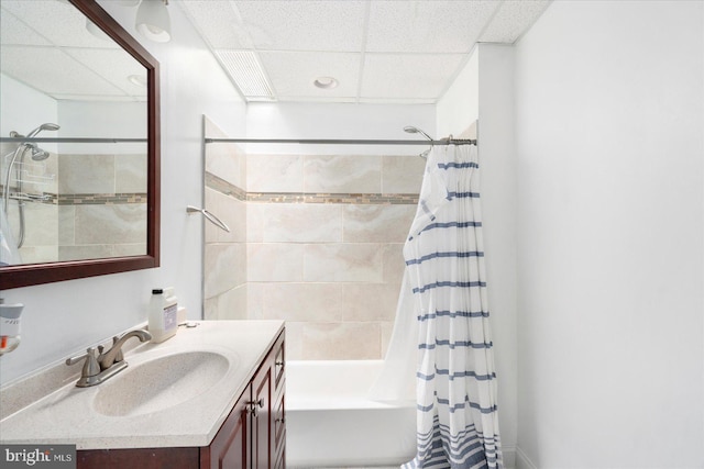 15 N Belnord Ave, Baltimore, MD 21224 - bathroom with vanity, a drop ceiling, and shower / bath combo with shower curtain