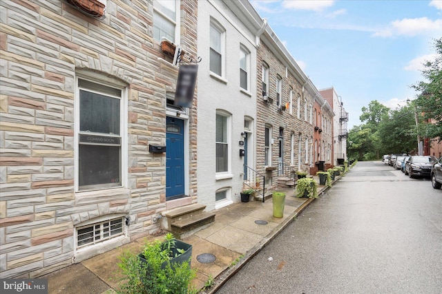 15 N Belnord Ave, Baltimore, MD 21224 - view of asphalt road with entry steps and curbs