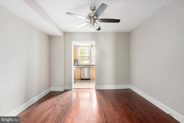 15 N Belnord Ave, Baltimore, MD 21224 - unfurnished room featuring wood-type flooring and ceiling fan