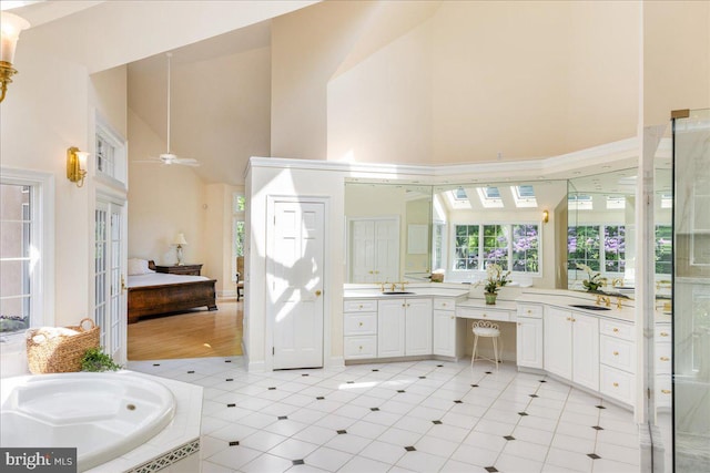 2630 Eagle Ln, Hellertown, PA 18055 - full bath featuring high vaulted ceiling, vanity, a bath, tile patterned flooring, and a shower with shower door