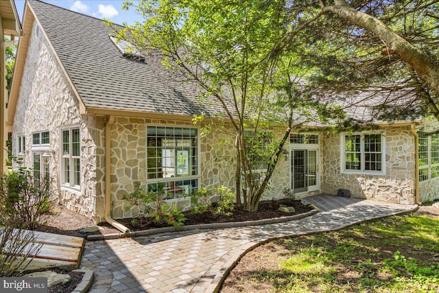 2630 Eagle Ln, Hellertown, PA 18055 - back of house with stone siding and a shingled roof
