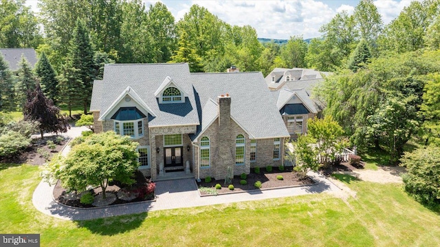 2630 Eagle Ln, Hellertown, PA 18055 - view of front facade with french doors, a chimney, and a front yard