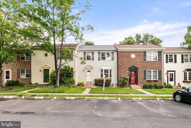 2919 Lexington Ct, Woodbridge, VA 22192 - multi unit property featuring entry steps, brick siding, and a front yard