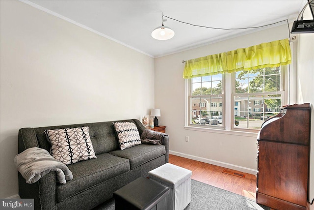 2919 Lexington Ct, Woodbridge, VA 22192 - living room with crown molding, wood finished floors, and baseboards
