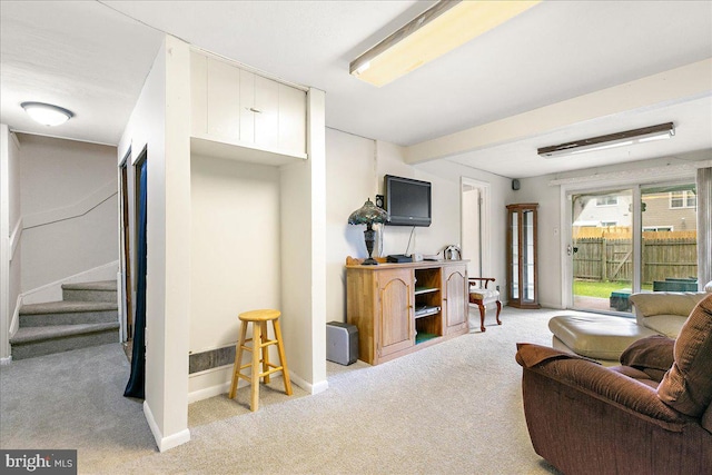 2919 Lexington Ct, Woodbridge, VA 22192 - living area featuring light carpet, stairway, and baseboards