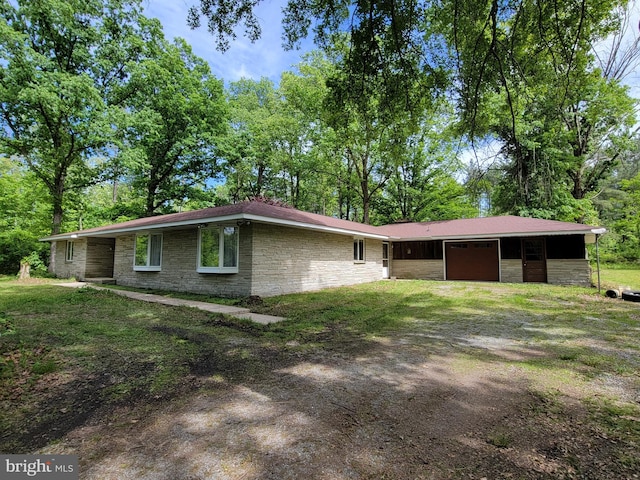 13337 Rowe Rd, Smithsburg, MD 21783 - view of front of home featuring dirt driveway, a garage, and stone siding