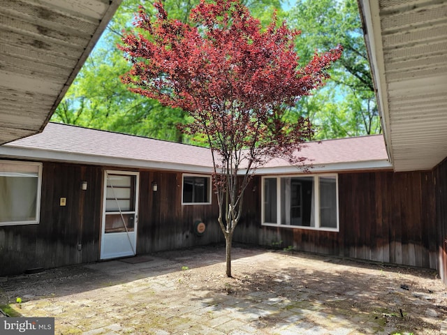 13337 Rowe Rd, Smithsburg, MD 21783 - back of house with a patio area and a shingled roof