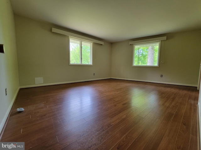 13337 Rowe Rd, Smithsburg, MD 21783 - spare room with healthy amount of natural light, dark wood-type flooring, and baseboards