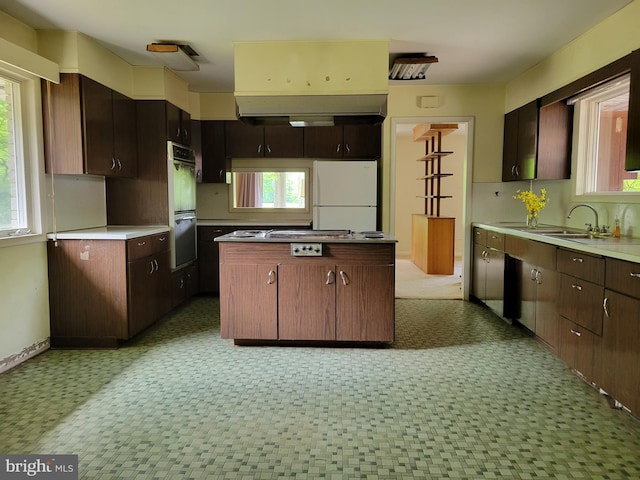 13337 Rowe Rd, Smithsburg, MD 21783 - kitchen featuring freestanding refrigerator, double wall oven, a sink, and light floors
