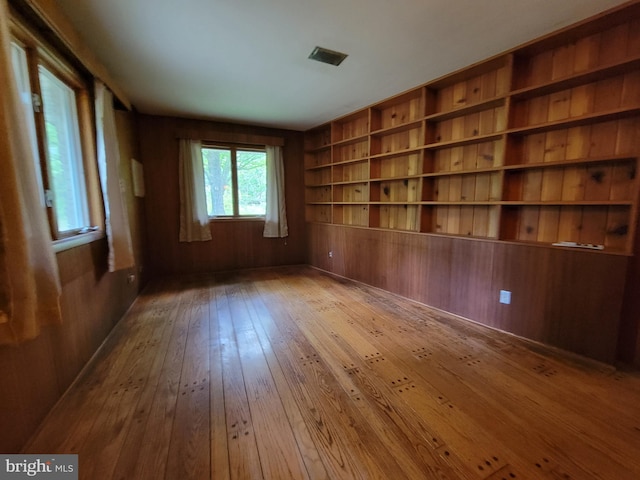 13337 Rowe Rd, Smithsburg, MD 21783 - empty room with wood-type flooring, built in features, and wood walls