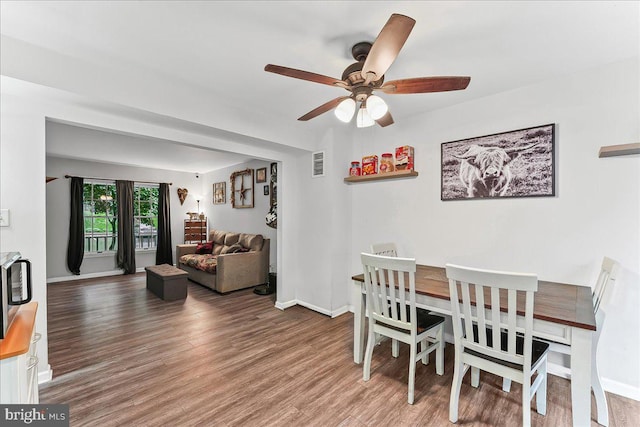 100 Cypress Dr, North East, MD 21901 - dining room with light wood-style floors, a ceiling fan, and baseboards