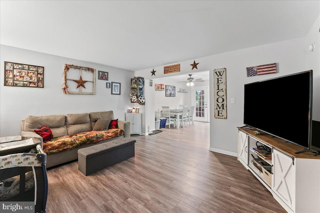 100 Cypress Dr, North East, MD 21901 - living area with wood finished floors, a ceiling fan, and baseboards