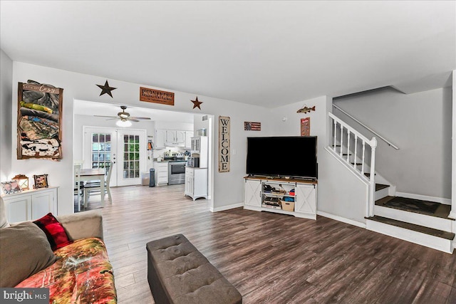 100 Cypress Dr, North East, MD 21901 - living room featuring wood finished floors, stairs, a ceiling fan, and baseboards