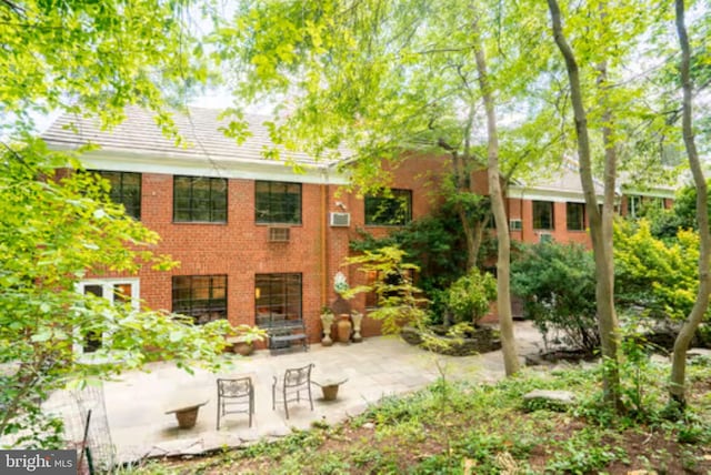 1647 Preston Rd, Alexandria, VA 22302 - back of house featuring a patio and brick siding