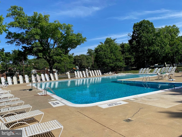 1647 Preston Rd, Alexandria, VA 22302 - community pool with a patio and view of scattered trees