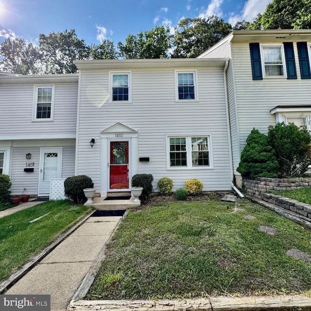 1410 Foxwood Ct, Annapolis, MD 21409 - townhome / multi-family property with a front yard
